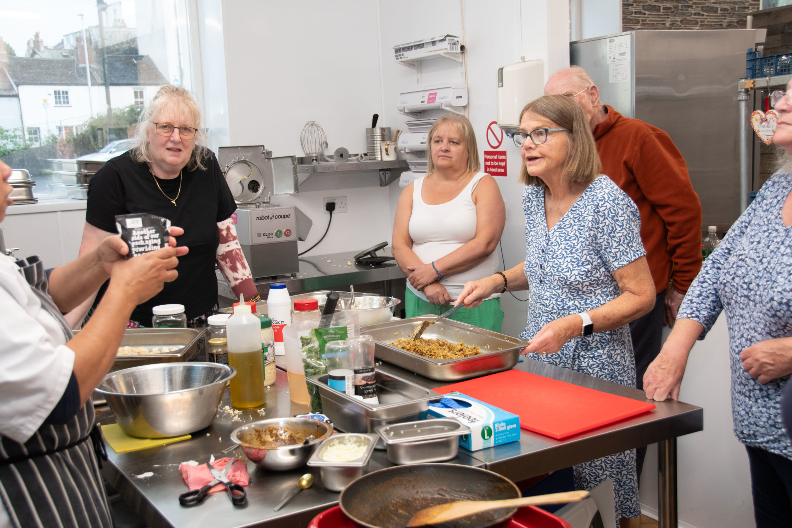 Adults participating in a low carb cookalong