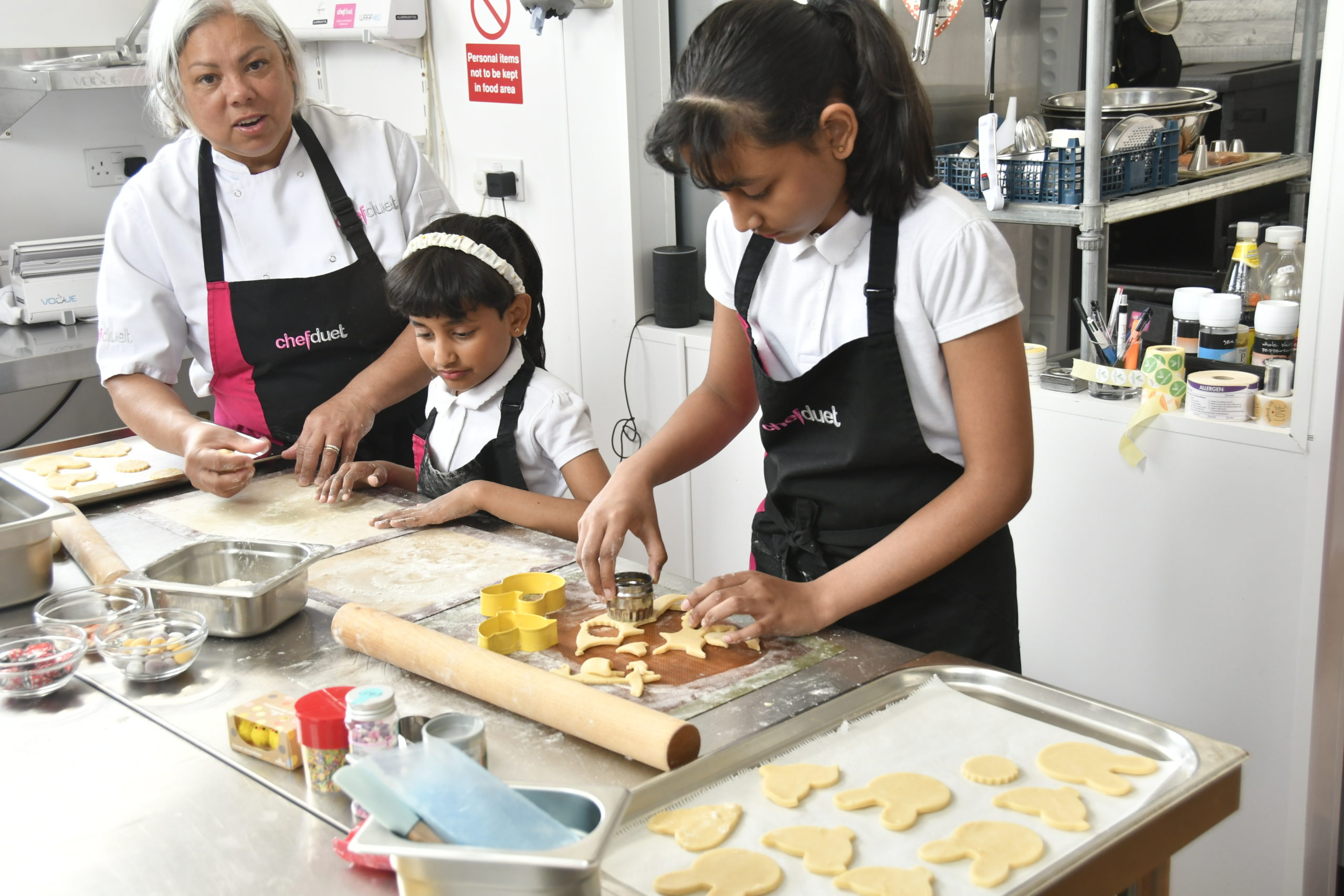 Students learning at Hands On Cookery School